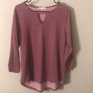 This is a long sleeve shirt with stripes